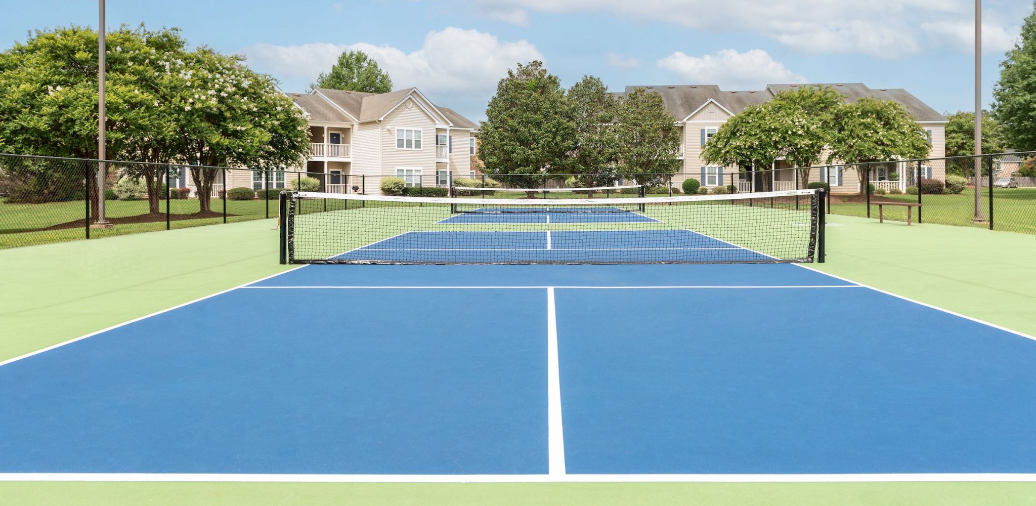 Professional tennis court for active living at Hawthorne Meadowview in Warner Robins, GA